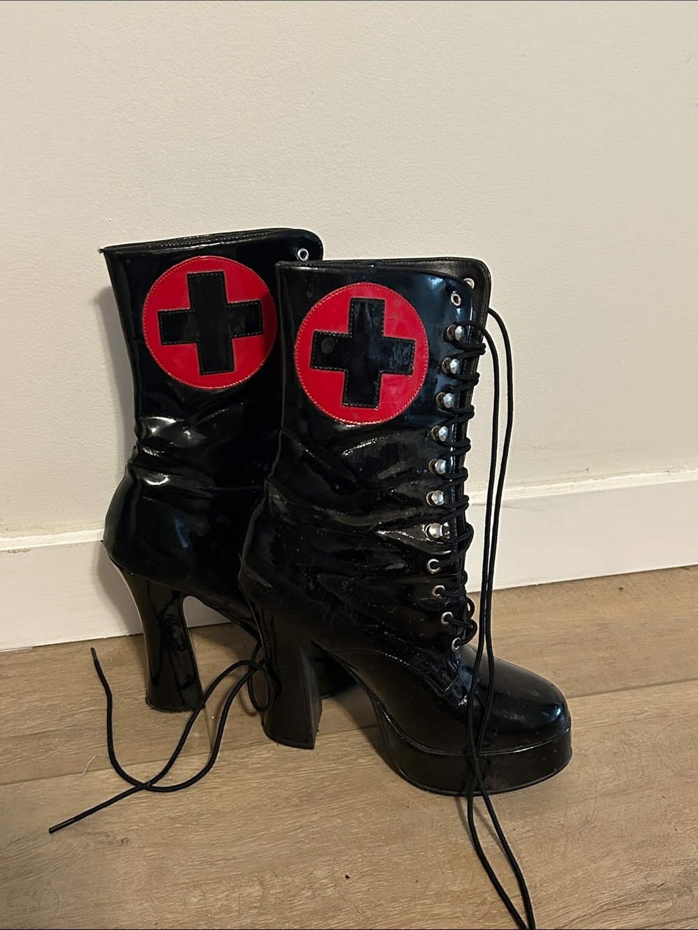Black Patent Lace-Up Platform Boots with Red Cross Accent